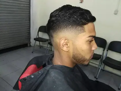 Corte hecho en Stev-Barber Studio, La Carpio (foto 1)