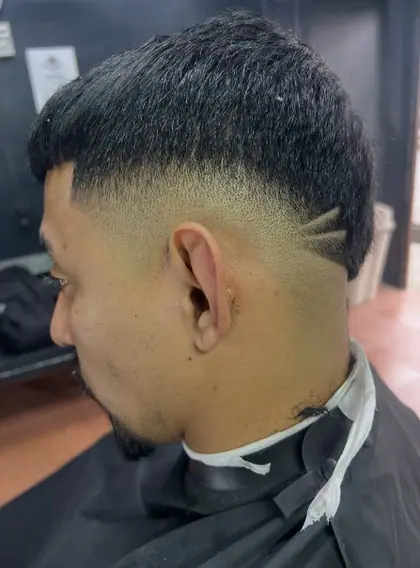 Corte hecho en Stev-Barber Studio, La Carpio (foto 3)